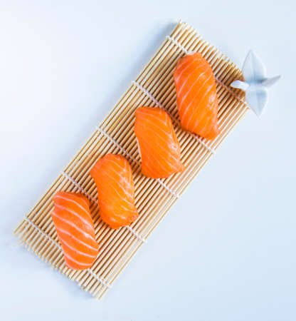 Salmon fish nigiri set on the white background, nigiri sushiの写真素材