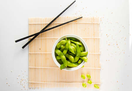 Soybean in the plate and chopsticks, asian foodの写真素材