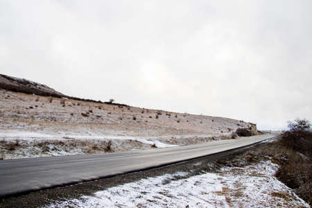 Mountain range winter landscape and view in Georgia, cloudy weatherの写真素材