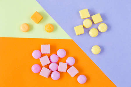 Sweet colorful confectionery, candy on the color background, high angle viewの写真素材