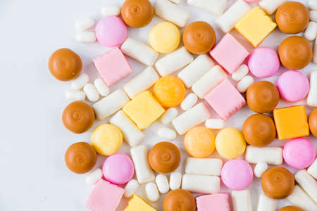 Sweet colorful confectionery, candy on the white background, high angle viewの写真素材