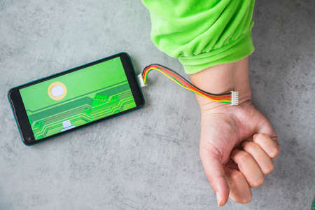 Cable and mobile, motherboard parts, digital communication, cellphone addicted and obsessionの写真素材