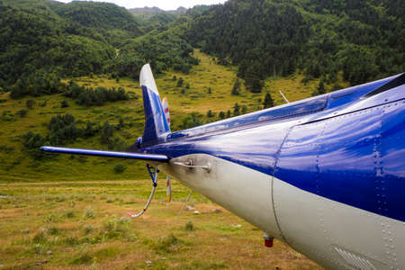 Helicopter tail close-up, blue and white helicopter viewの写真素材