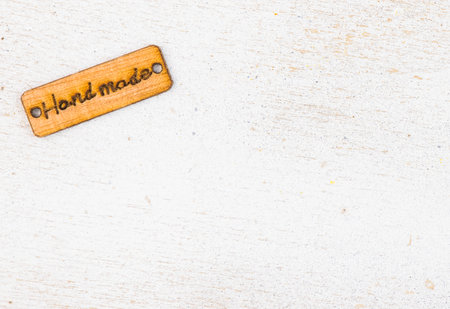 Handmade text on the wood, white backgroundの写真素材