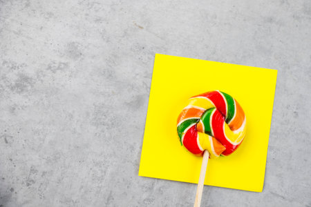 Colorful candies, lollypop on the color backgroundの写真素材