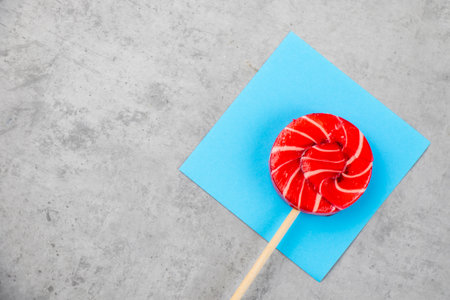 Colorful candies, lollypop on the color backgroundの写真素材