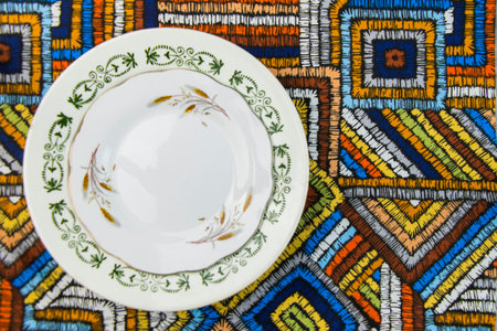 Empty tableware and dishware settings and serving on the gray background, plate, bowl and vintage spoonの写真素材