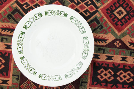 Empty tableware and dishware settings and serving on the gray background, plate, bowl and vintage spoonの写真素材