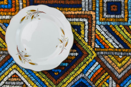Empty tableware and dishware settings and serving on the gray background, plate, bowl and vintage spoonの写真素材