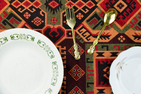 Empty tableware and dishware settings and serving on the gray background, plate, bowl and vintage spoonの写真素材