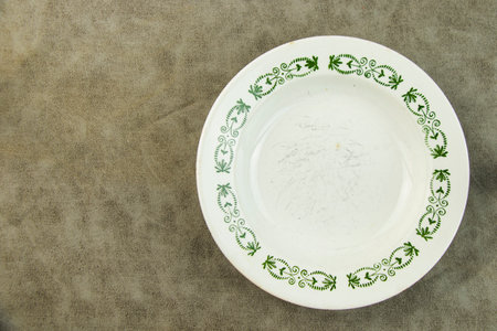 Empty tableware and dishware settings and serving on the gray background, plate, bowl and vintage spoonの写真素材
