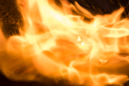 Candle lights in fire, fire background, abstractの写真素材