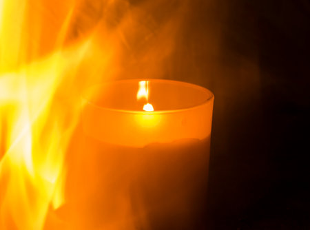 Candle lights in fire, fire background, abstractの写真素材