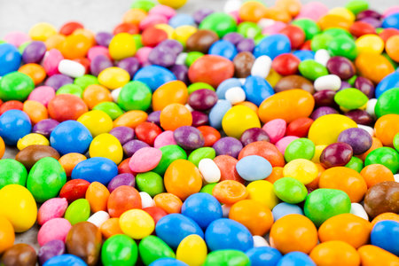 Candy on the white background, high angle view of colorful candiesの写真素材