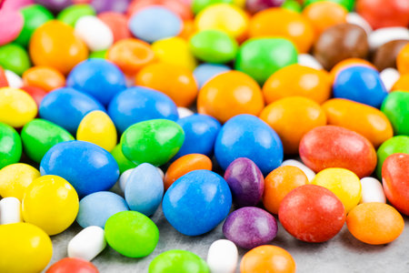 Candy on the white background, high angle view of colorful candiesの写真素材