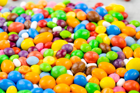 Candy on the white background, high angle view of colorful candiesの写真素材