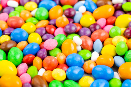 Candy on the white background, high angle view of colorful candiesの写真素材