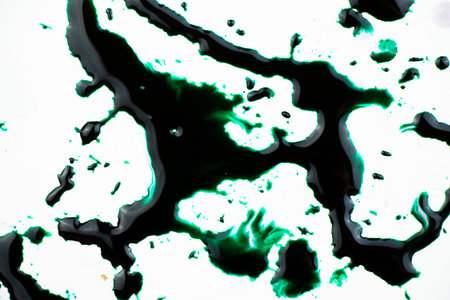 green color ink paint on the white backgroundの写真素材
