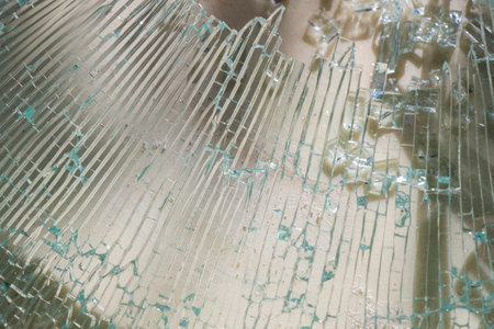 Broken glass background, shadows and lightsの写真素材