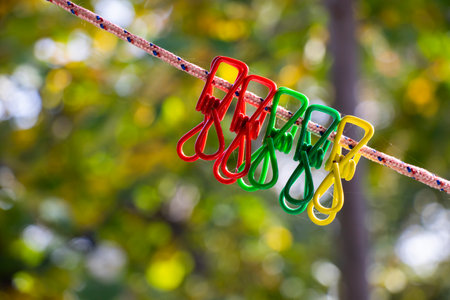 Colorful clothespins background in yardの写真素材