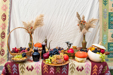 Fruits and nuts on the table for wedding, red wine and foodの写真素材