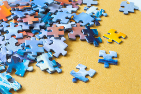 Colorful puzzles on the yellow backgroundの写真素材