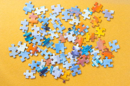 Colorful puzzles on the yellow backgroundの写真素材
