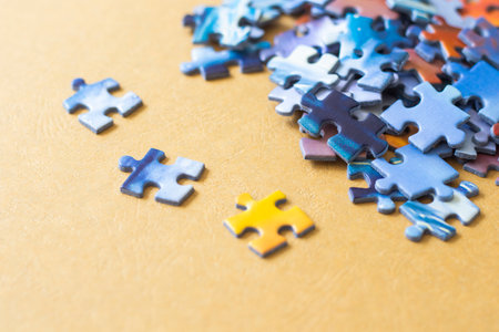Colorful puzzles on the yellow backgroundの写真素材