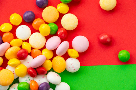 Candy on the green and red background