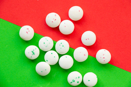 Candy on the green and red background