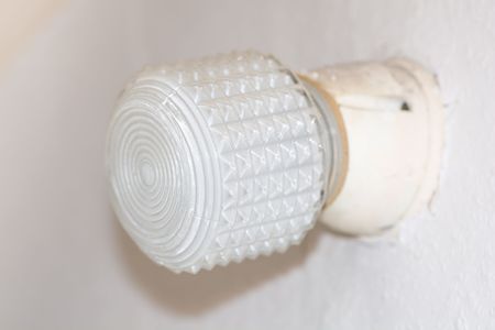 Old retro lamp on the wallの写真素材