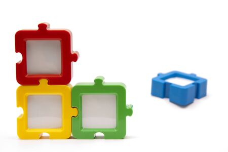 Puzzel photo frames in a square arragement, in various colors, and isolated on white background.の写真素材