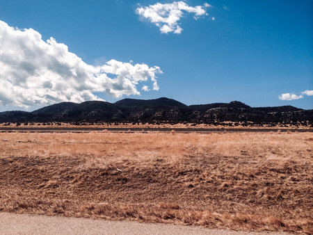 train tracks in front of mountainの写真素材