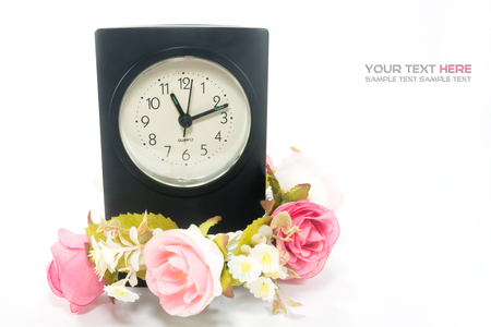 clock with flower in white backgroundの写真素材