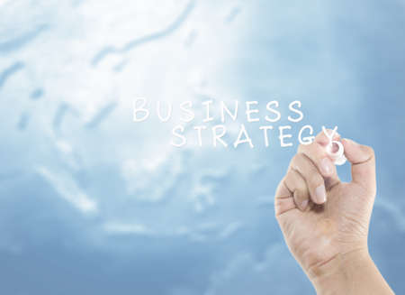 business strategy concept with hand writingの写真素材
