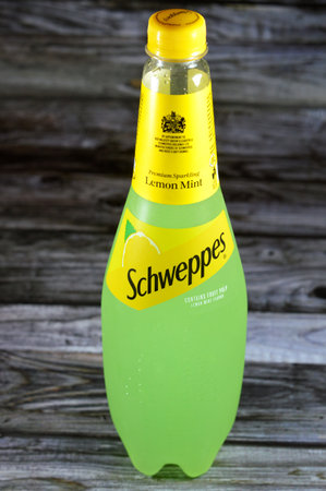 Giza, Egypt, July 27 2023:  Schweppes premium sparkling soft drink contains fruit pulp lemon mint flavor, Schweppes is a beverage brand that originated in the Republic of Geneva created in 1783のeditorial素材
