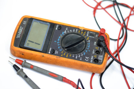 Cairo, Egypt, July 27 2023: DT9205A A digital multimeter, a test tool used to measure two or more electrical values, principally voltage (volts), current (amps) and resistance (ohms), selective focusのeditorial素材