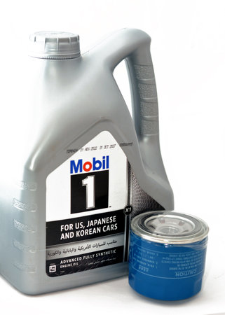 Cairo, Egypt, January 23 2023: Mobil one 1 5W-30 Dexos GM approved, Advanced fully synthetic engine oil and  KIA and Hyundai Oil Filter for Elantra and Kia Cerato, car maintenance and service conceptのeditorial素材