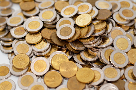 Large amount of Egyptian coins, Piles of 1 EGP LE one Egyptian pound and half a pound 50 fifty...