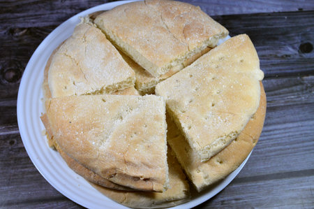 Cornbread, a quick bread made with cornmeal, the cuisine of the Southern United States, with origins in Native American cuisine, an example of batter bread, made mainly by Cornmeal, baking powderの写真素材