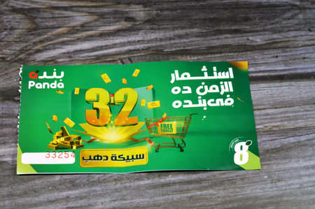 Cairo, Egypt, September 11 2023: Panda supermarket 32nd anniversary coupon for an opportunity of winning one of 32 gold bars and free trolly, the annual feast of Panda hypermarkets, A Saudi marketのeditorial素材