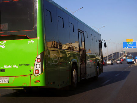 Cairo, Egypt, September 10 2023: The green bus for mass transit transporting passengers inside Cairo, A project of the Public Transport Authority with internet availability and air conditioningのeditorial素材
