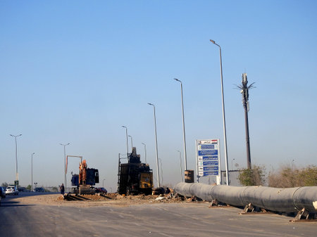 Cairo, Egypt, September 10 2023: preparations to place large water pipe parts in place, sanitation pipes, improvement of infrastructure and real estate developmental projects in Egypt, water linesのeditorial素材