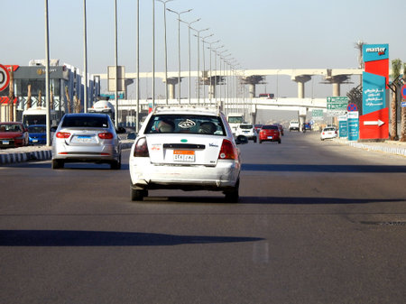 Cairo, Egypt, September 10 2023: Cairo is served by its white taxis which have been introduced in the early 2010s and aren't run by a company, but by individuals, a white Hyundai Verna Cairo Taxiのeditorial素材