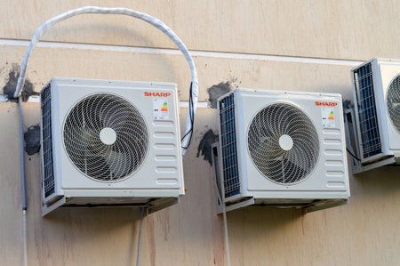 Cairo, Egypt, September 17 2023: Sharp air conditioner compressor for cooling and ventilation of the...