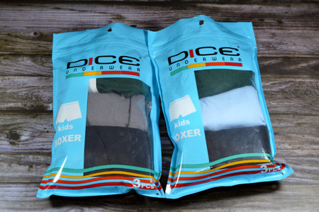 Cairo, Egypt, September 27 2023: Dice boxer shorts kids' wear underwear in plain colors, loose boxers are type of undergarment typically worn by men and kids, Selective focusのeditorial素材