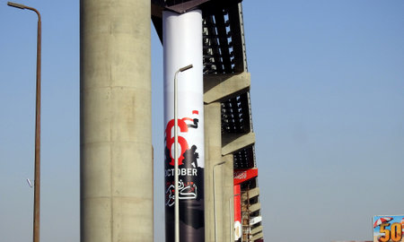 Cairo, Egypt, September 29 2023: 6th of October 1973 war victory 50th golden jubilee, Egyptian flag, national day of Egyptian victories on monorail columns, celebrations of Egypt victorious dayのeditorial素材