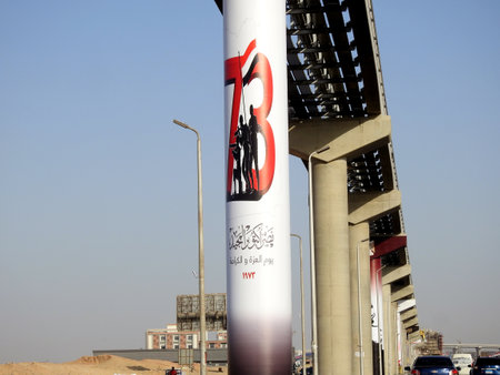 Cairo, Egypt, September 29 2023: 6th of October 1973 war victory 50th golden jubilee, Egyptian flag, national day of Egyptian victories on monorail columns, celebrations of Egypt victorious dayのeditorial素材