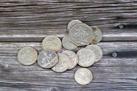Old coins ,Iraqi money background of old coins of dinars and fractions of  dinar of different eras,...
