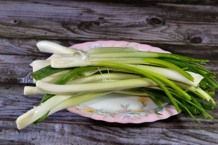 Scallions, green spring onions, vegetables derived from various species in the genus Allium. Scallions generally have a milder taste than most onions and their close relatives like garlic and shallotの写真素材